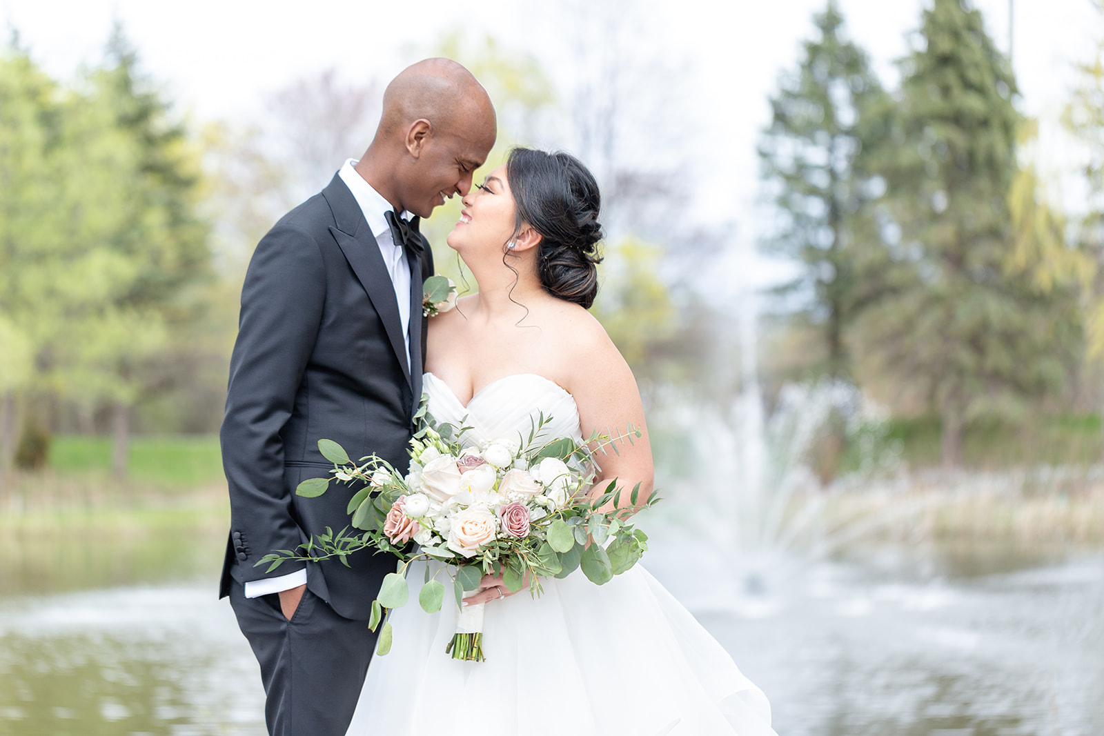 bride and groom nose to nose in Arlington Estate wedding photos